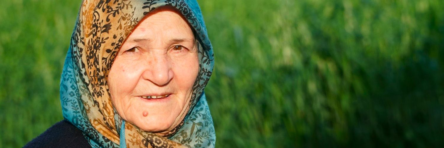 Older woman with headscarf